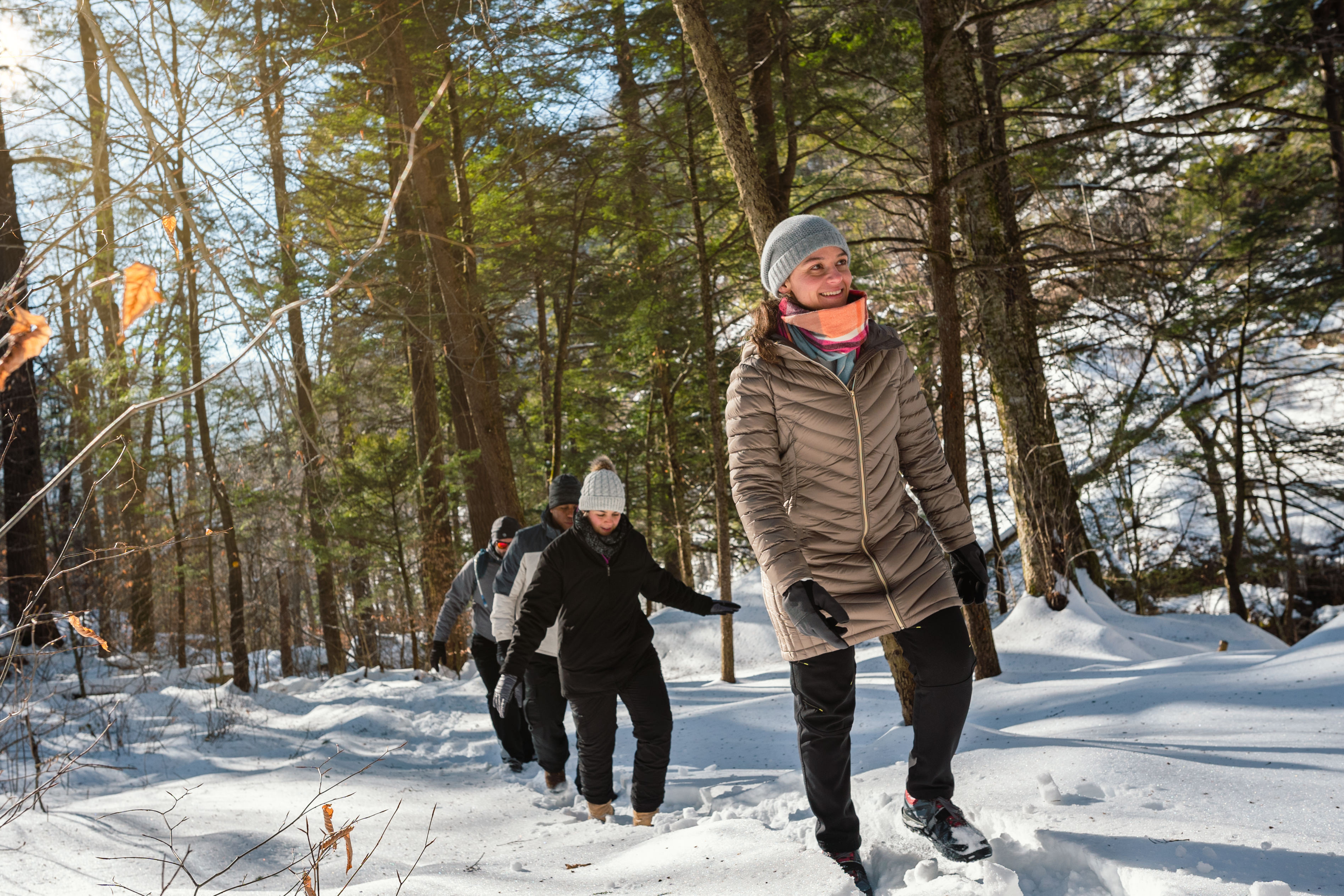 People Hiking on the Mountain with Snow