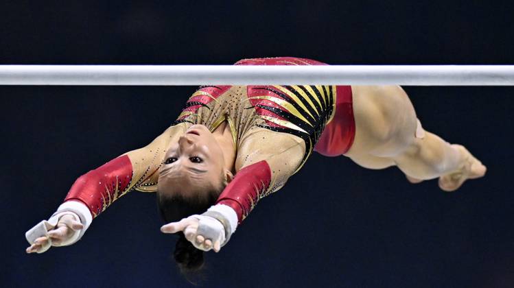 Belgian gymnast Nina Derwael pictured in action during the women's uneven bars competition at the qualifications on the first day of the World Artistic Gymnastics Championships in Liverpool, Saturday 29 October 2022. The Worlds take place from October 29 until November 6, 2022 in Liverpool, United Kingdom. BELGA PHOTO ERIC LALMAND