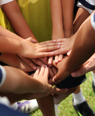 group of young people's hands