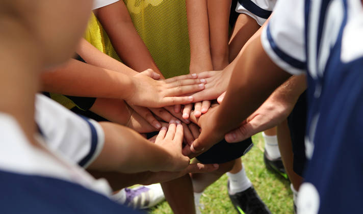 group of young people's hands