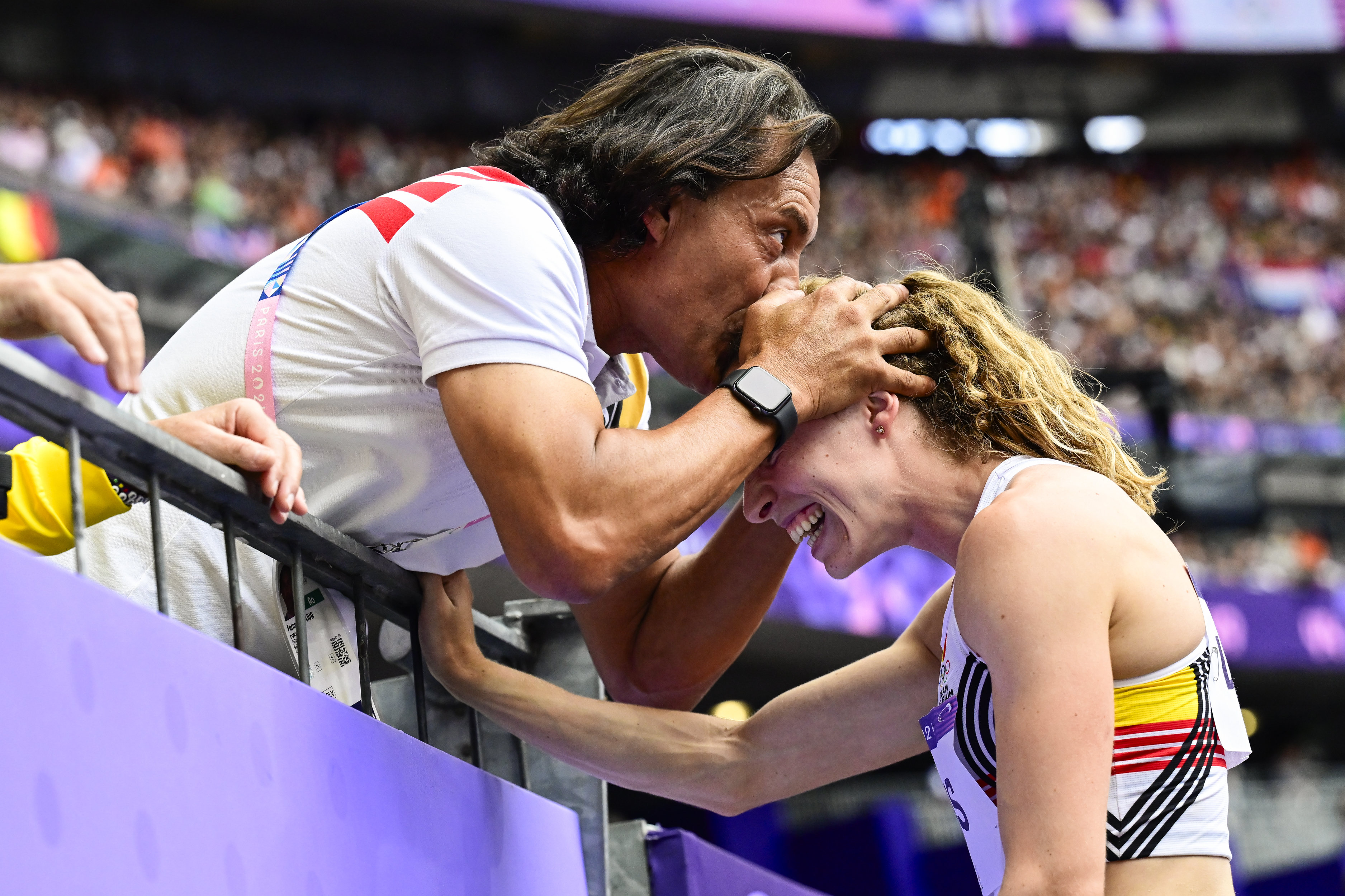 Athletics coach Fernando Oliva and Belgian athlete Noor Vidts celebrate after the javelin, sixth event of the women's heptathlon at the athletics competition at the Paris 2024 Olympic Games, on Friday 09 August 2024 in Paris, France. The Games of the XXXIII Olympiad are taking place in Paris from 26 July to 11 August. The Belgian delegation counts 165 athletes competing in 21 sports. BELGA PHOTO DIRK WAEM